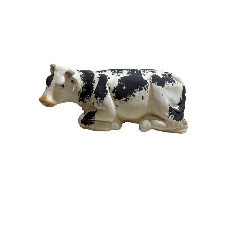 la vache noire couchée