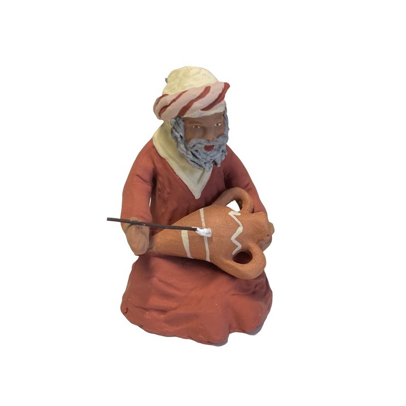 l'homme oriental décorateur de poteries