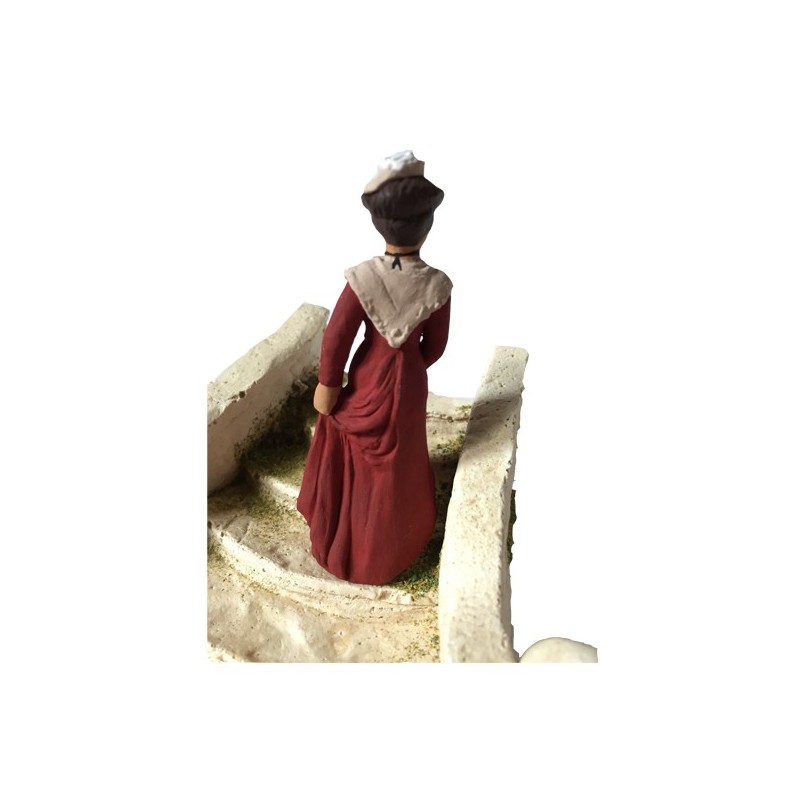 l'Arlésienne rouge montant l'escalier